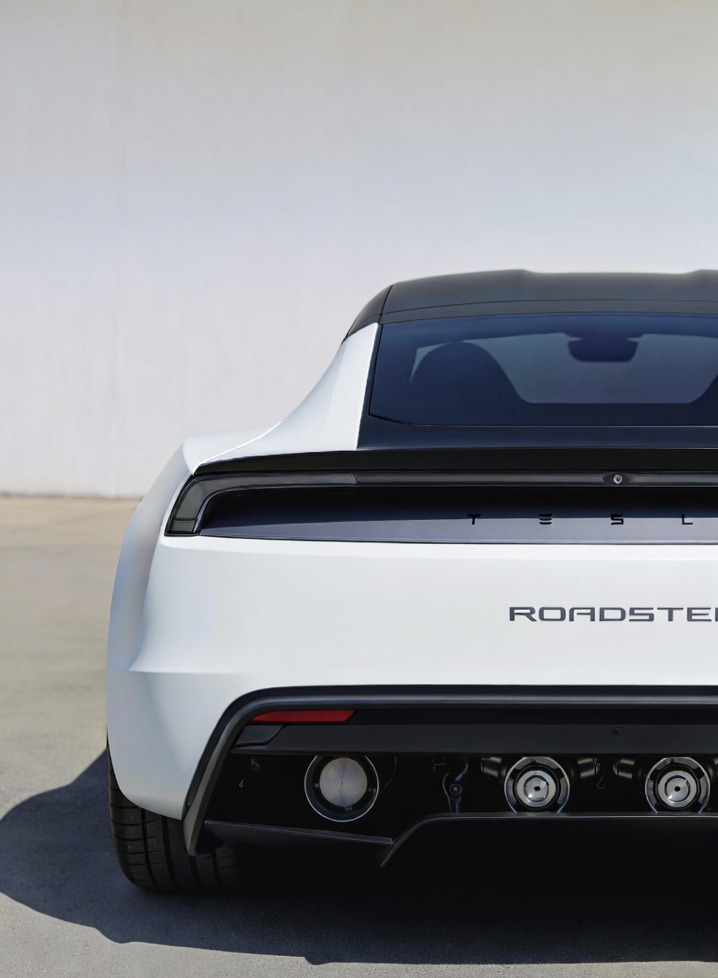 Tesla Roadster 2025 sleek design with rocket thrusters, highlighting performance in 2025